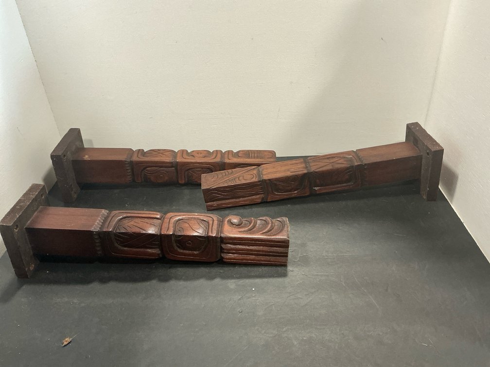 Carved wood posts with mounting plates