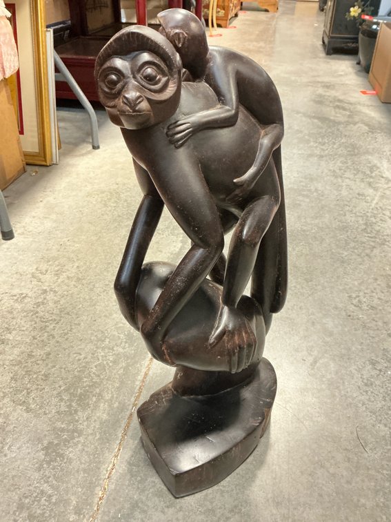 Carved dark wood monkey and baby sculpture