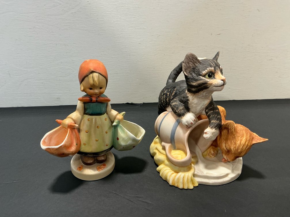 Ceramic figurines of girl with baskets & kittens