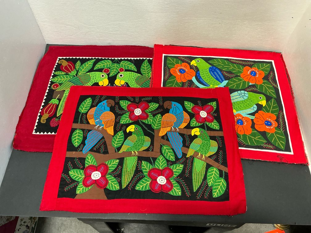 Parrot and floral appliqué textile panels