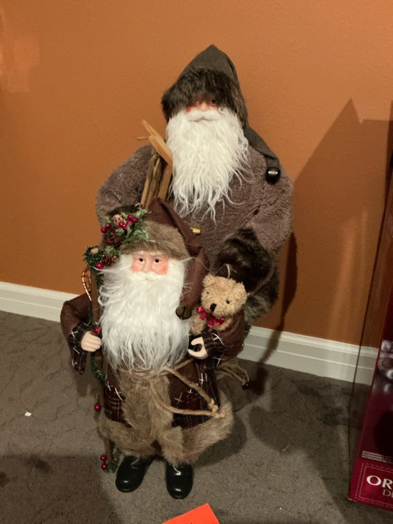 Pair of rustic standing Santa Claus figurines - Upstairs Bedroom Upper Level