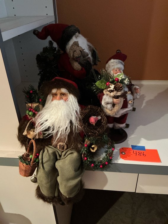 Assorted Santa Claus decorative figurines - Upstairs Bedroom Upper Level