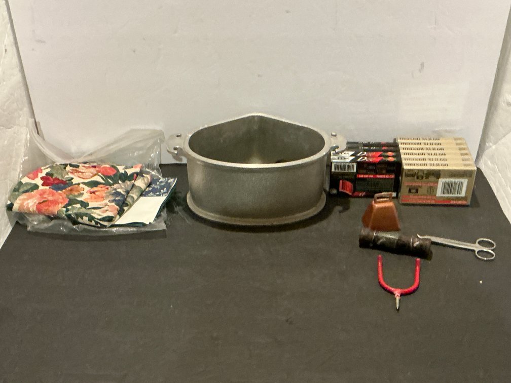 Aluminum wedge pot, cassette tapes, fabric & tools - Basement