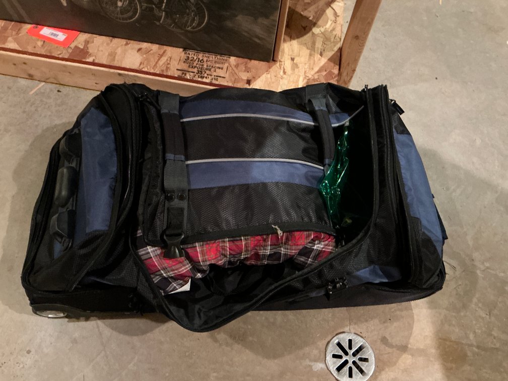 Grouping of travel & gear bags with contents - Basement