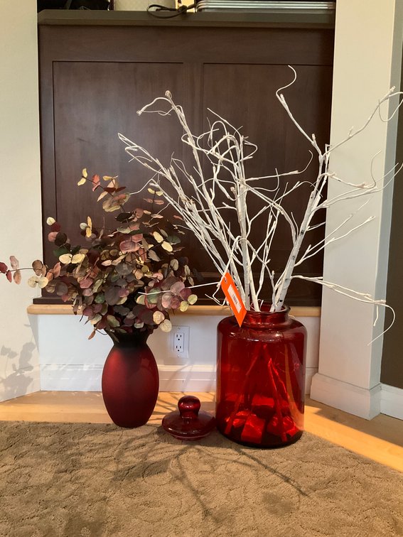 Pair of red glass vases with faux foliage & branches - Living Room Main Level