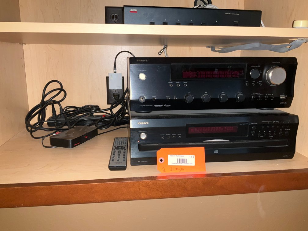 Integra stereo receiver & 6-disc CD changer with remote - Living Room Main Level