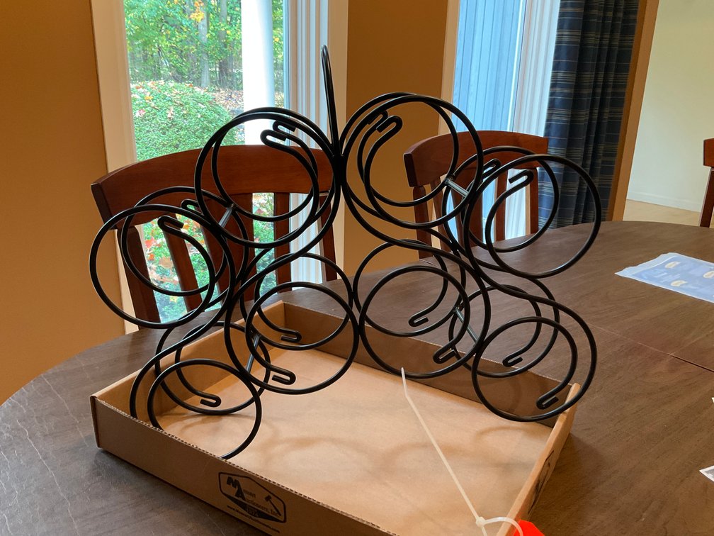 Black metal 6-bottle tabletop wine rack - Formal Dining Room Main Level