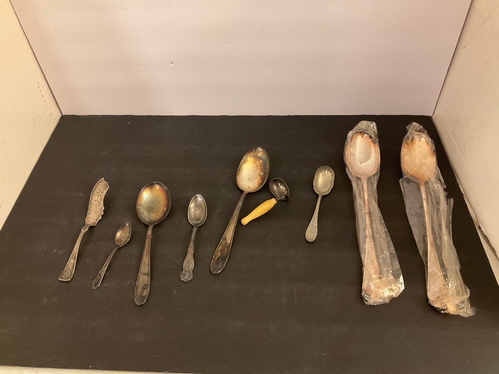Grouping of silver-tone flatware & serving pieces - Kitchen Main Level