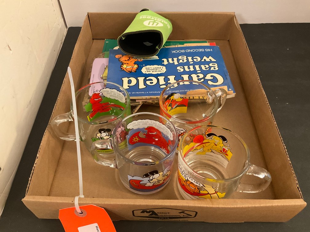 Glass mugs with comic books & can cooler - Kitchen Main Level