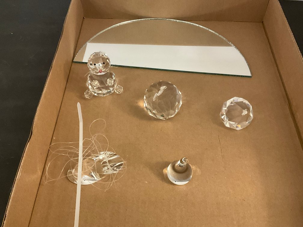 Grouping of faceted crystal figurines & prisms - Dining Room Main Level