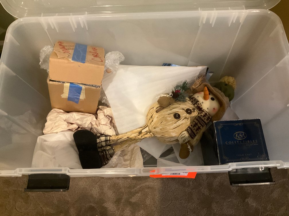 Snowman figurine & boxed collectibles in storage tote - Upstairs Bedroom Upper Level