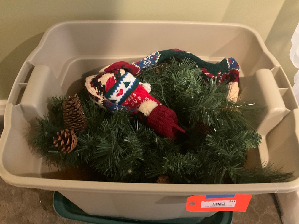 Storage tote of Christmas decor with garland & wreath - Upstairs Bedroom Upper Level