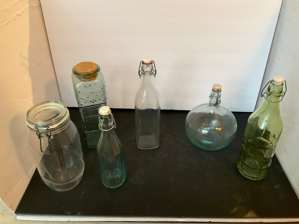 Glass bottles & jar with swing-top stoppers - Living Room Main Level