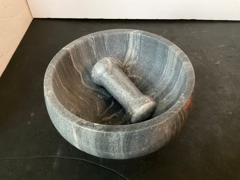 Carved gray marbled stone mortar & pestle - Living Room Main Level