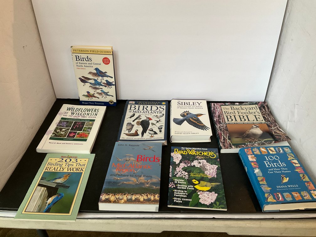 Grouping of bird & nature field guides & books - Living Room Main Level