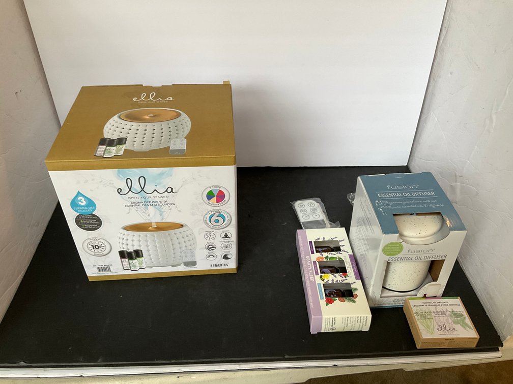 Grouping of aroma diffusers & essential oil sets - Living Room Main Level