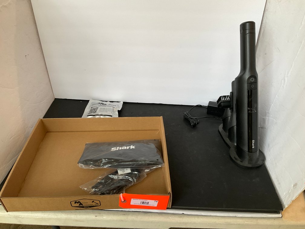 Shark cordless handheld vacuum with base & accessories - Living Room Main Level