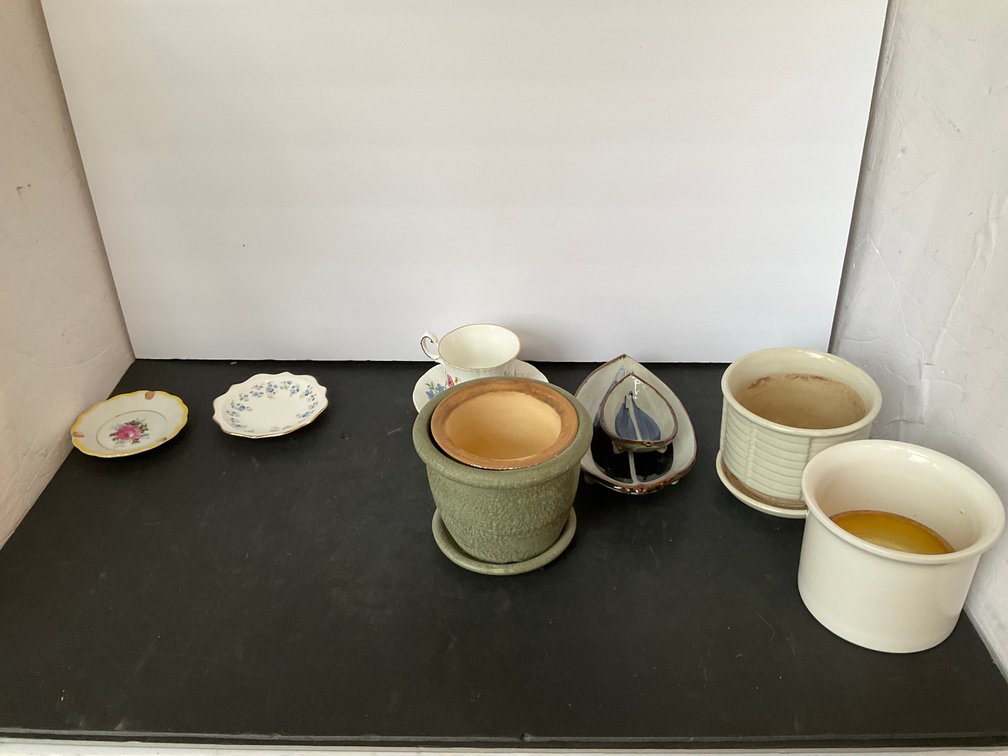 Grouping of ceramic planters, teacup set & dishes - Living Room Main Level