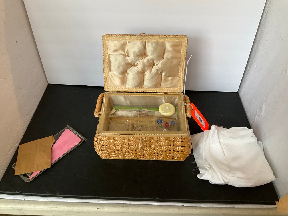 Woven wicker sewing basket with notions & fabric - Living Room Main Level