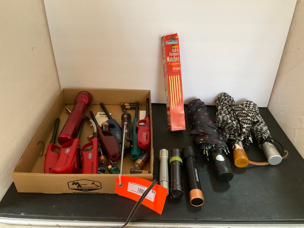Flashlights, utility lighters, umbrellas & matches - Living Room Main Level