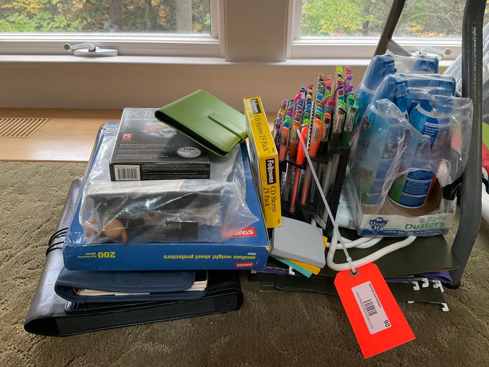 Grouping of office and desk supplies - Living Room Main Level