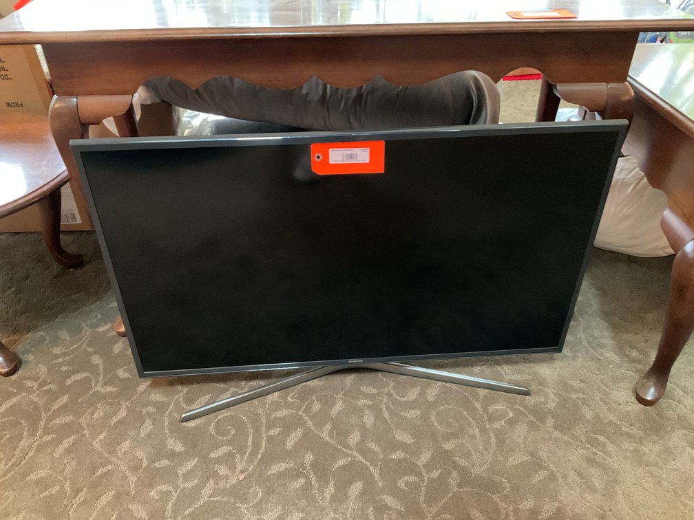 40” Samsung flat-panel television with stand - Living Room Main Level
