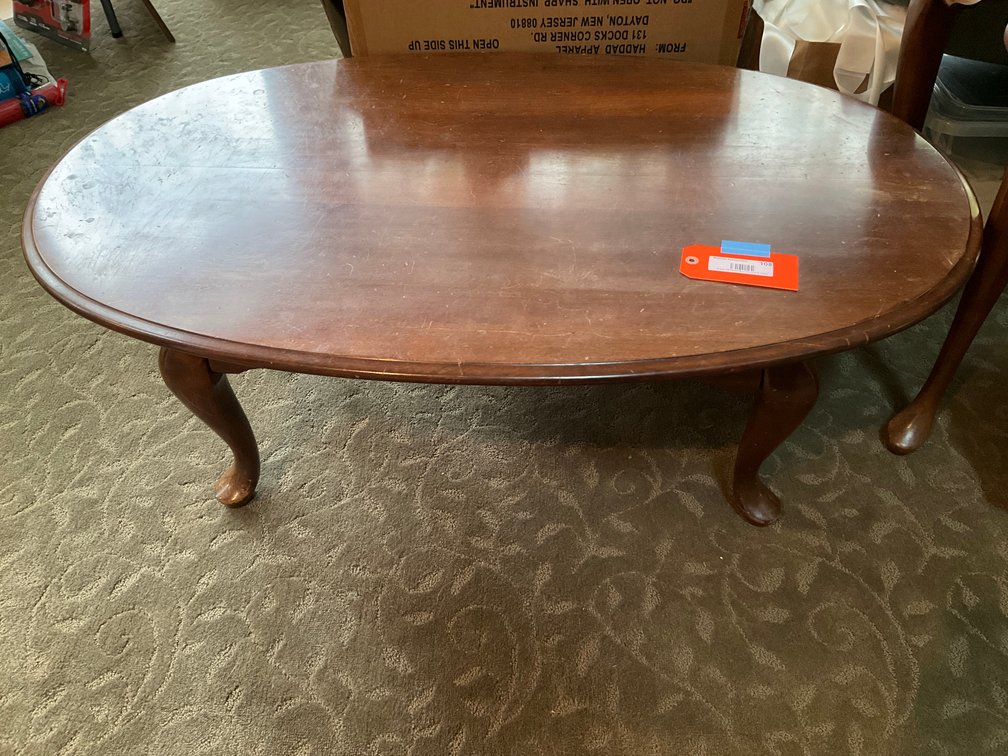 Oval wood coffee table with cabriole legs and pad feet - Living Room Main Level