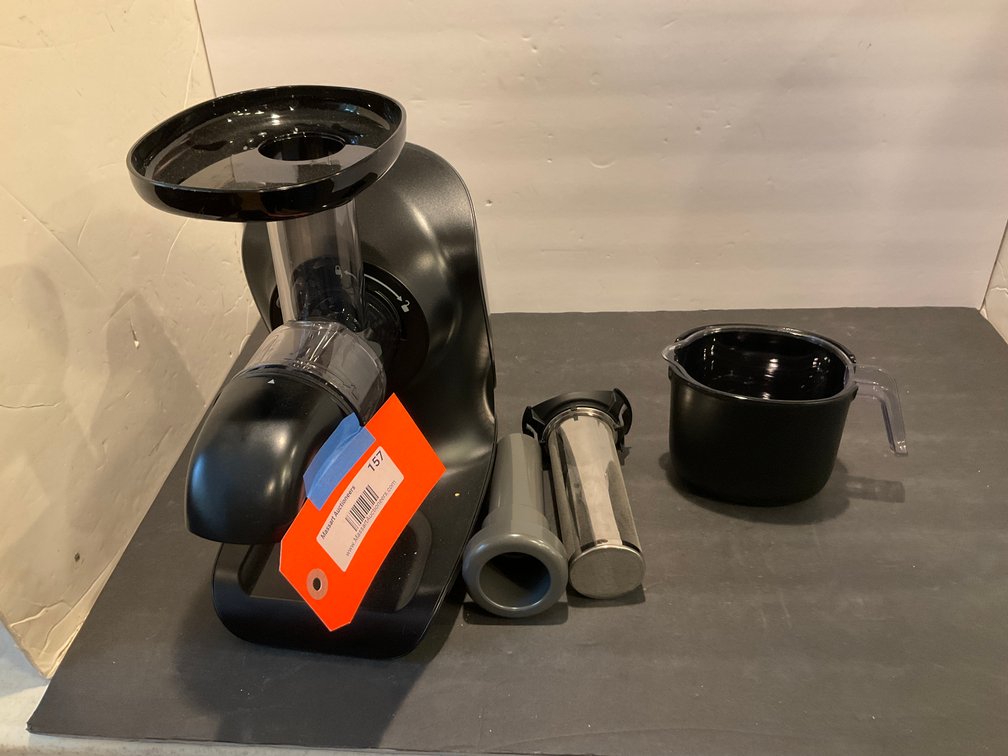 Black horizontal masticating juicer with pitcher - Kitchen Main Level
