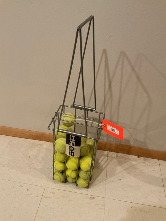 Head wire tennis ball hopper with tennis balls - Basement