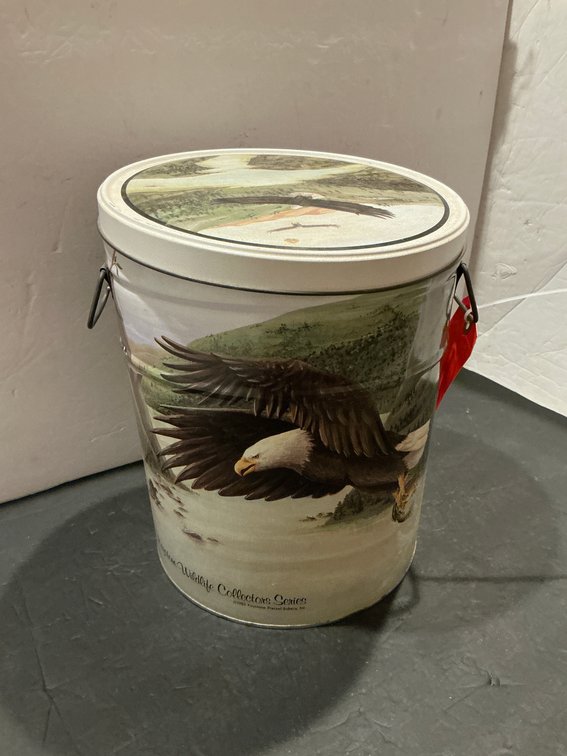 Eagle tin bucket & metal can of assorted matchbooks - Basement