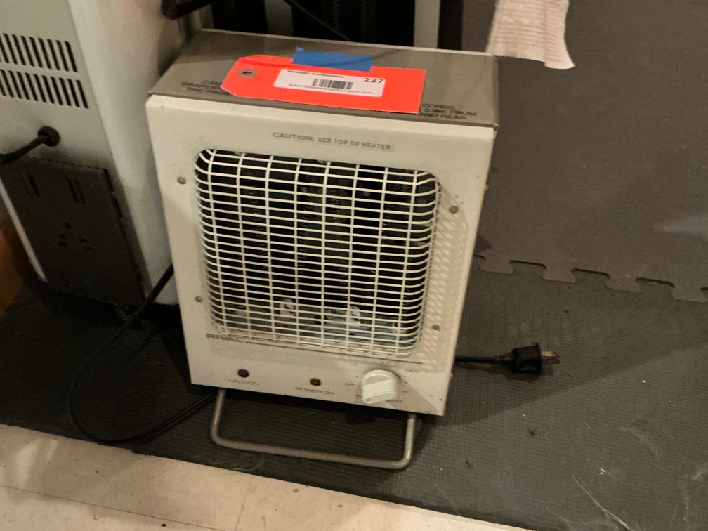 Grouping of 3 portable electric space heaters - Basement