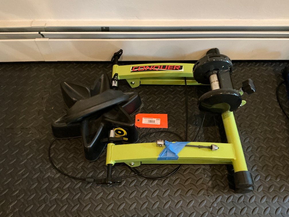 Conquer indoor bike trainer with CycleOps riser block - Basement