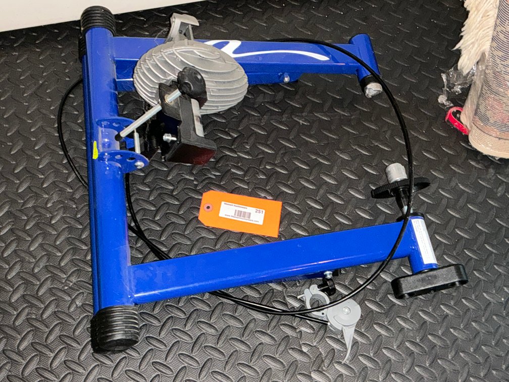 Blue folding indoor bicycle trainer stand - Basement