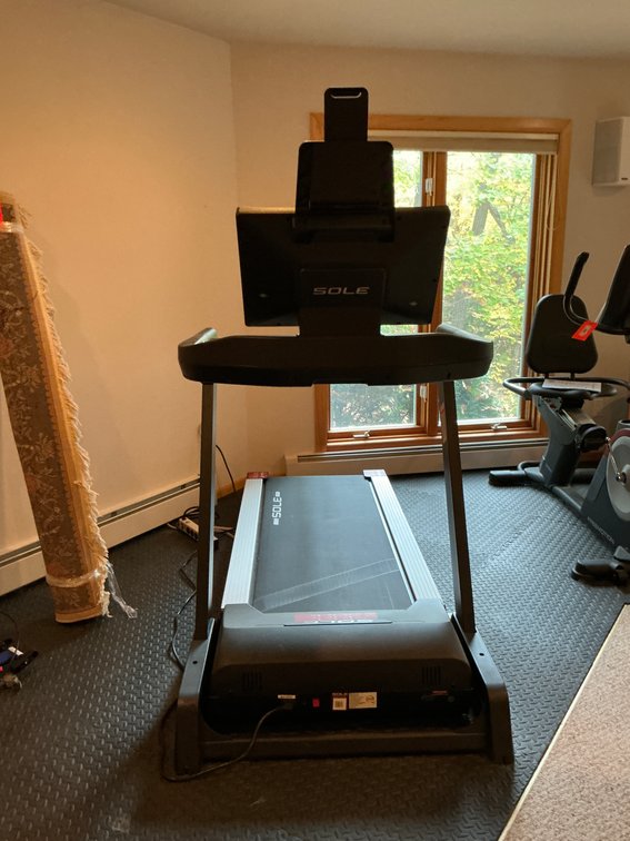 Sole motorized treadmill with owner's manual - Basement