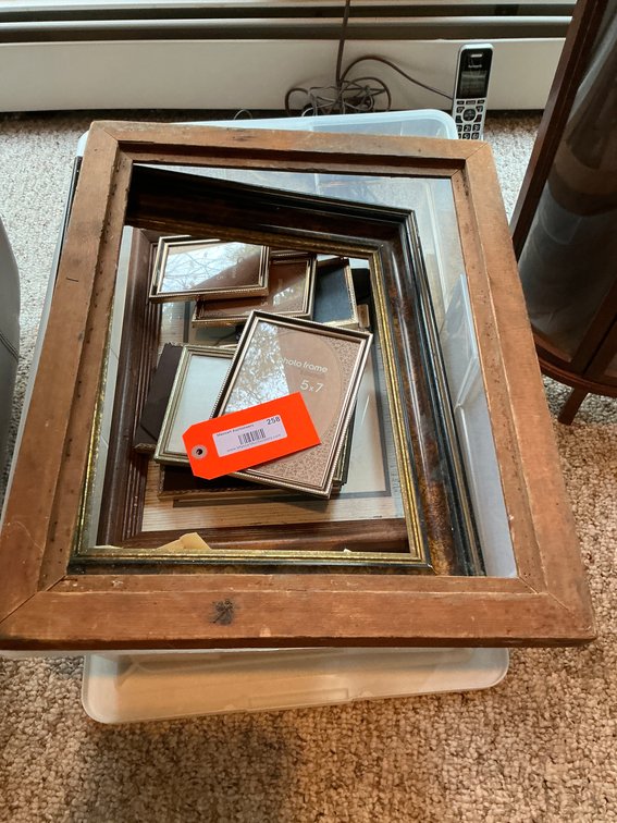 Grouping of picture frames - Basement