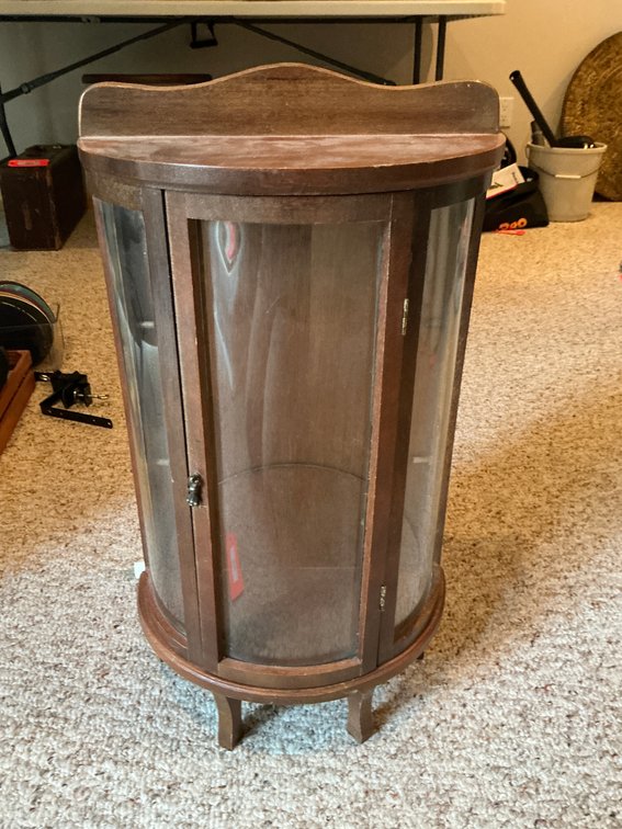 Small curved-glass wood curio cabinet 12 x 7 x 22 - Basement