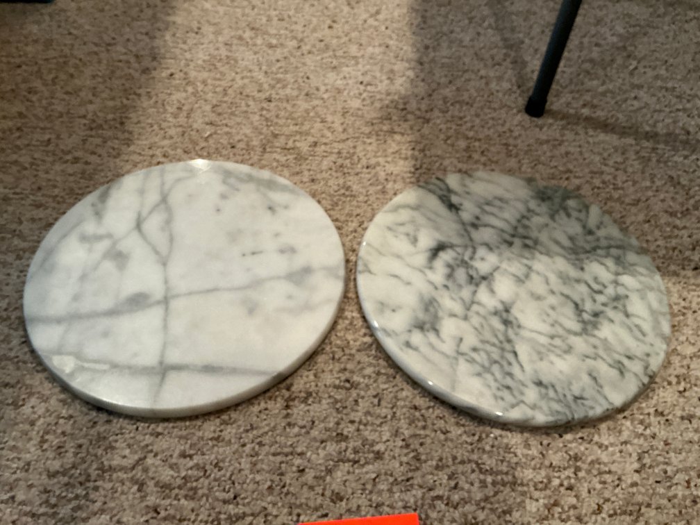 Pair of circular white & grey marble slabs 14” diameter - Basement