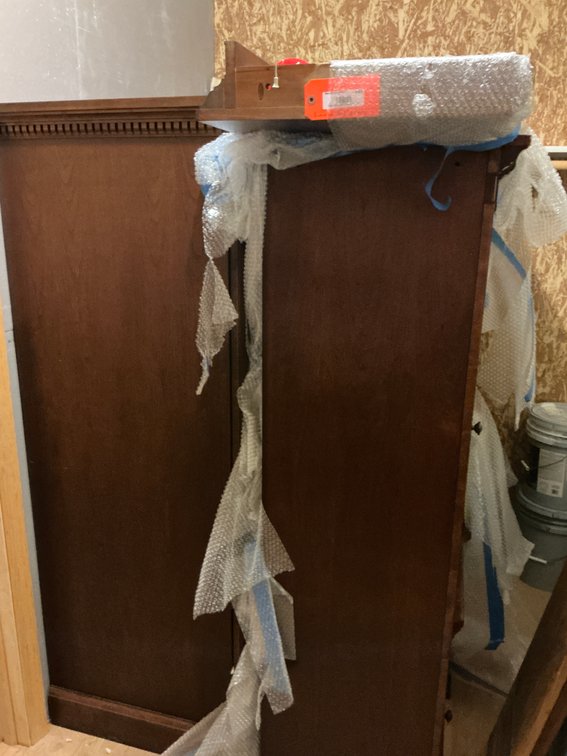 Armoire & Wood entertainment center with glass door & dentil molding - Basement