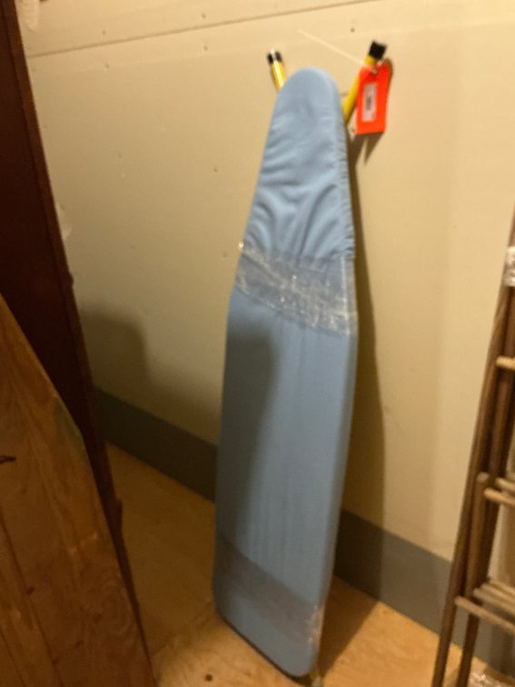Grouping of wooden & folding ironing boards - Basement