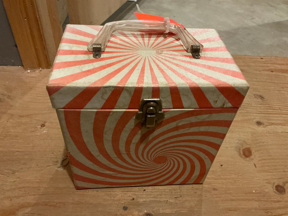 Swirl pattern record carrying case with 45 RPM records - Basement