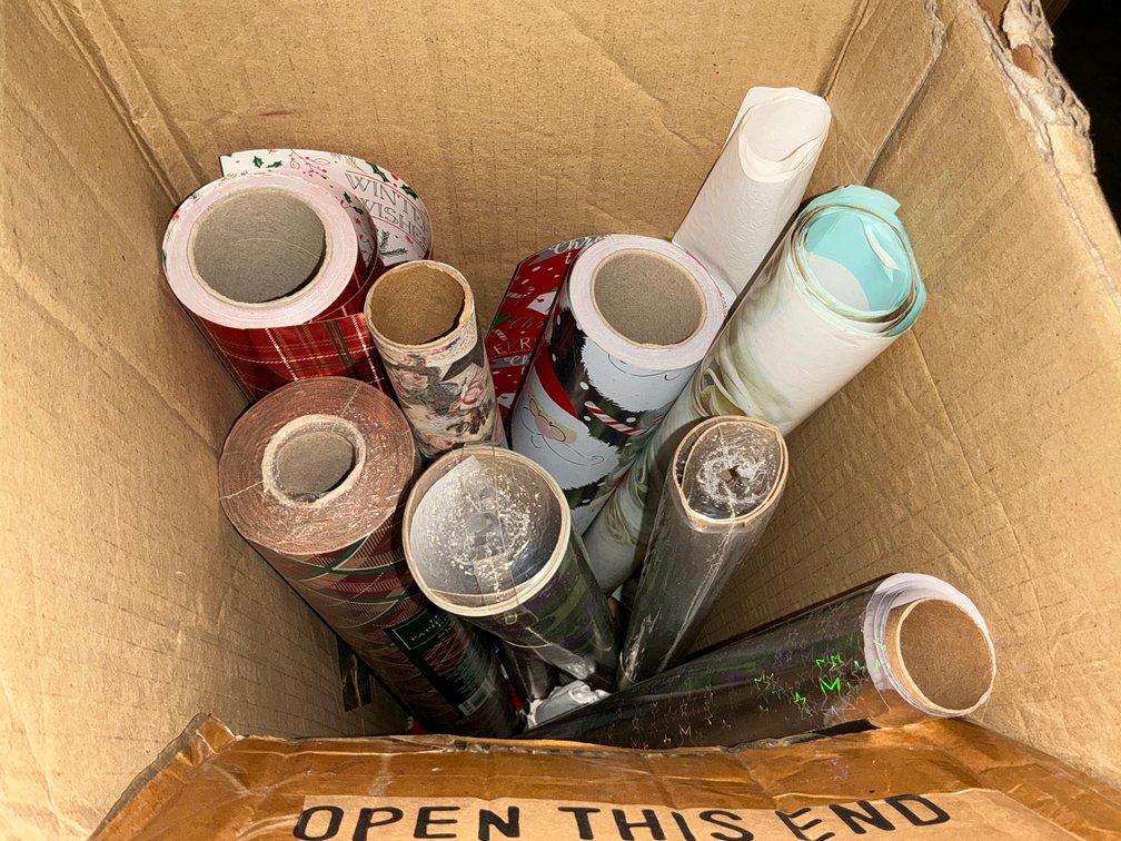 Assorted gift wrapping paper & cellophane rolls - Basement