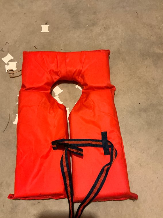 Grouping of life vests & personal flotation devices - Basement