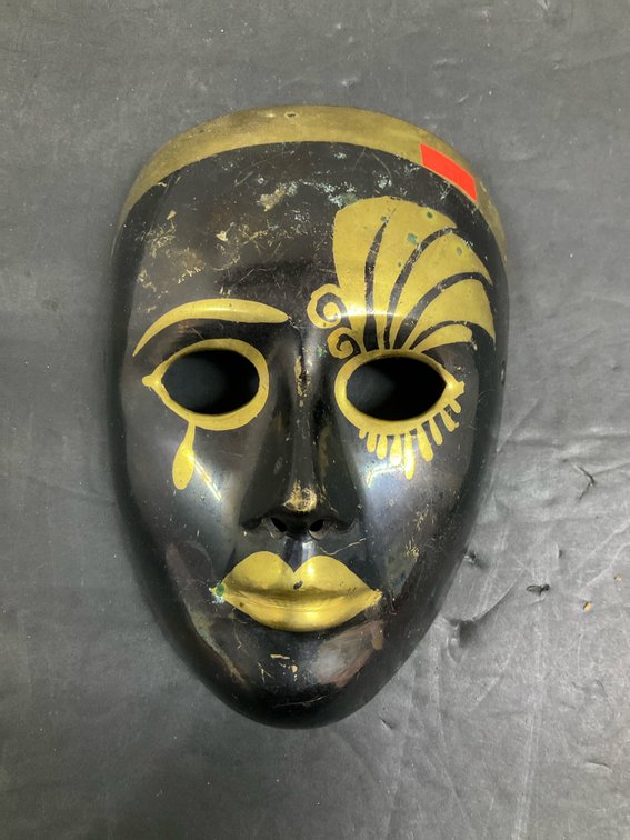 Cast metal decorative face mask with brass accents