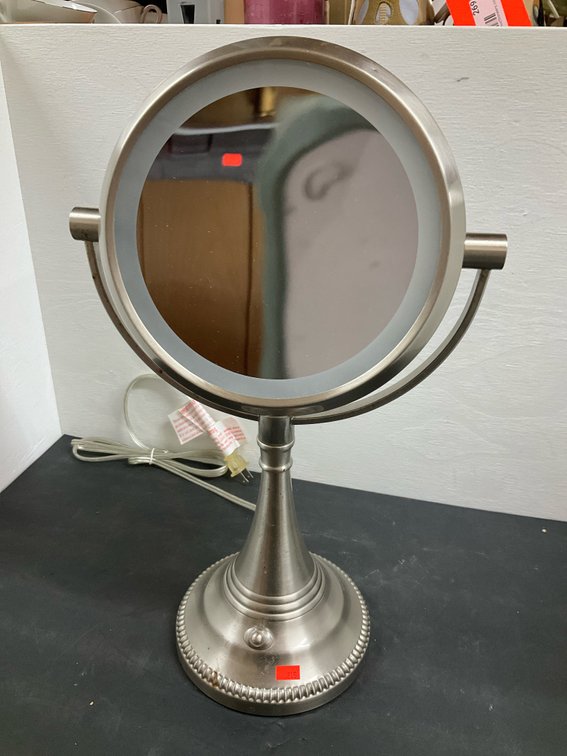 Brushed nickel lighted pedestal vanity mirror
