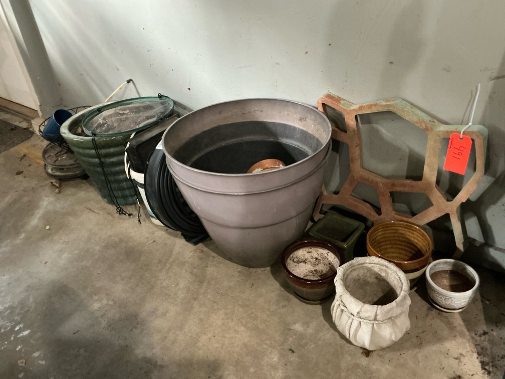 Grouping of assorted planters & garden decor - Garage