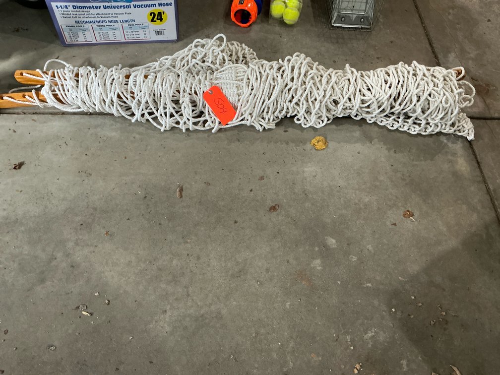 Woven rope hammock with wooden spreader bars - Garage
