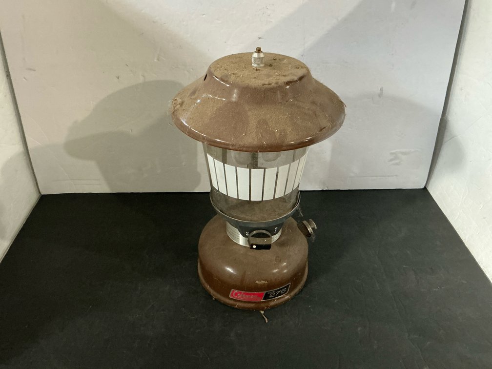 Coleman brown lantern with striped glass globe - Garage