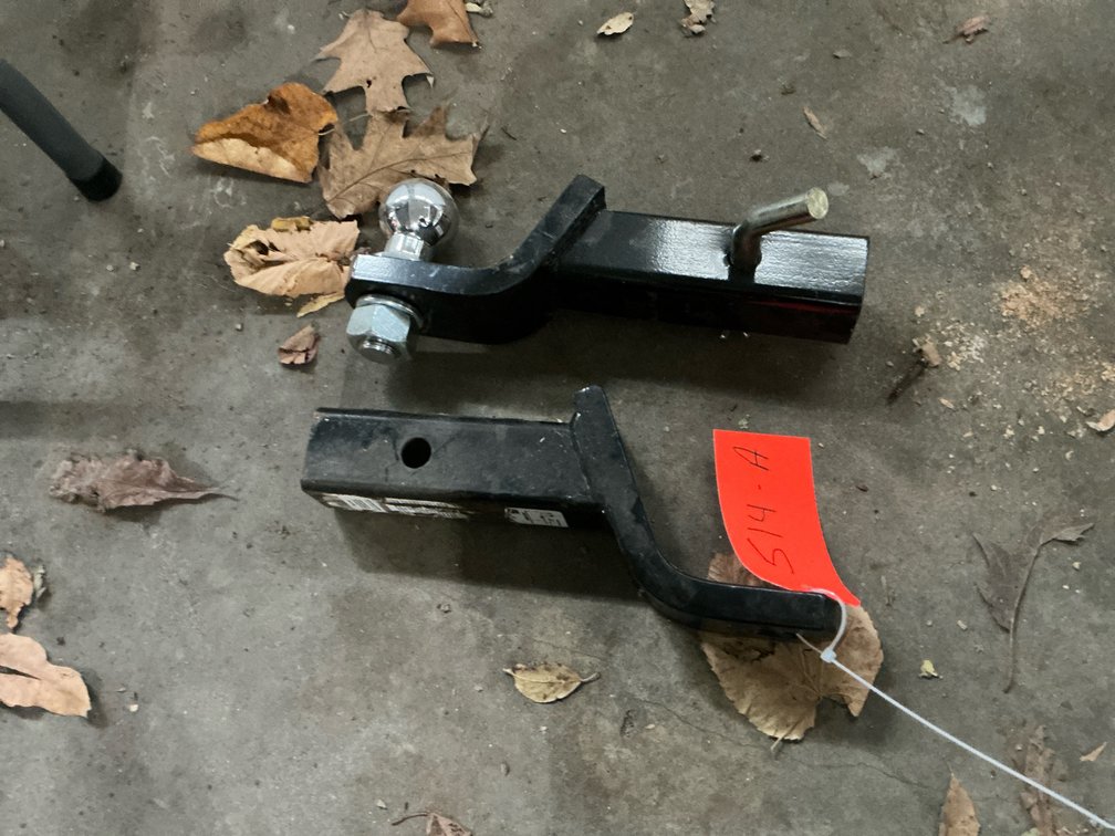 Pair of black steel trailer hitch ball mounts - Garage