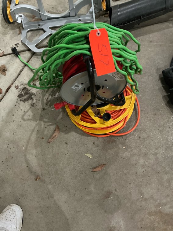 Grouping of cord reels & extension cords - Garage