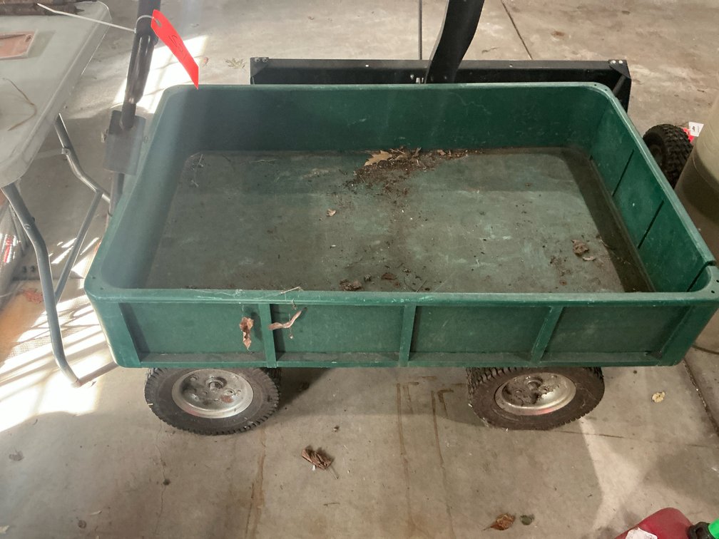 Green poly garden wagon with pneumatic tires - Garage